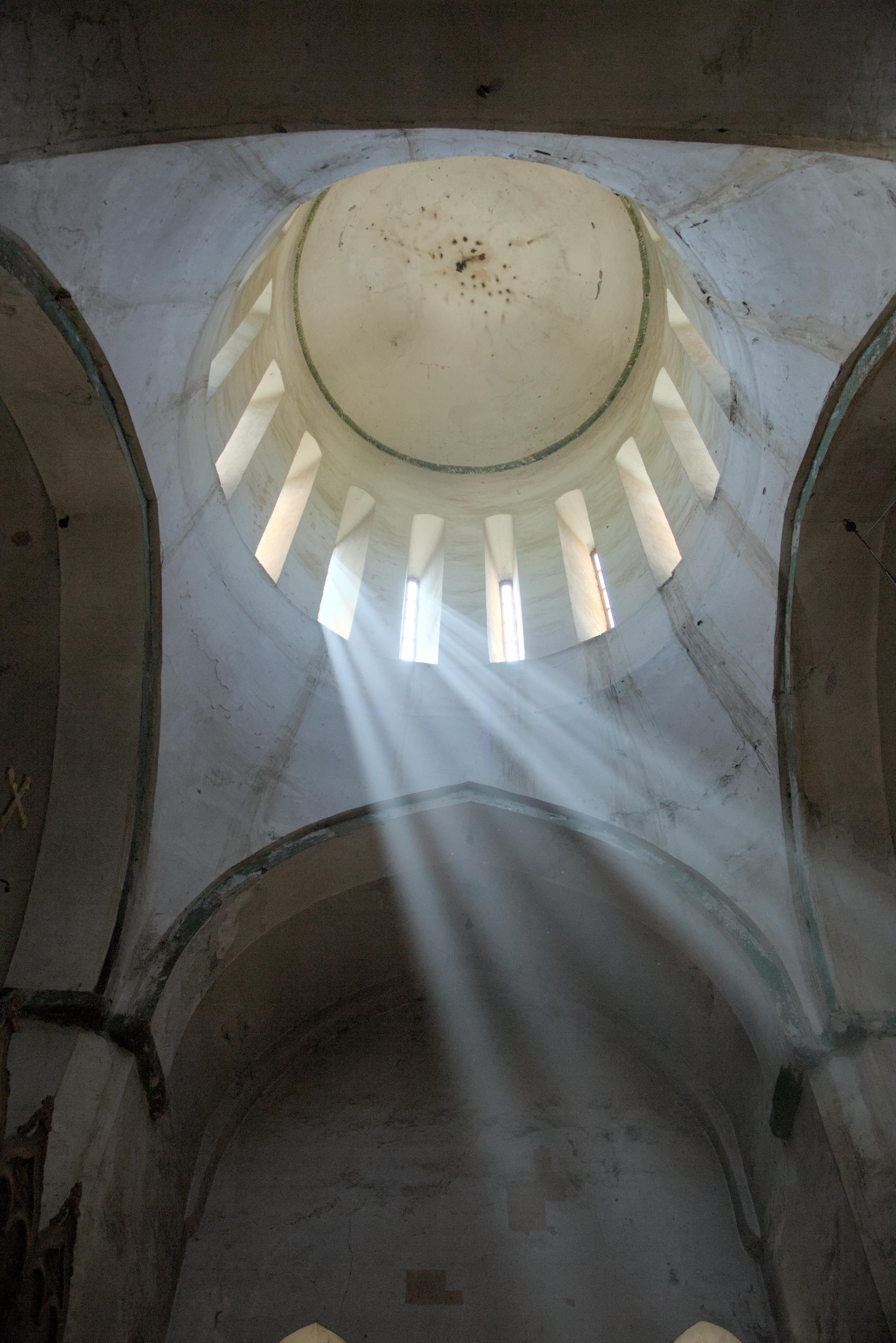 Sunlight through the windows of a church.