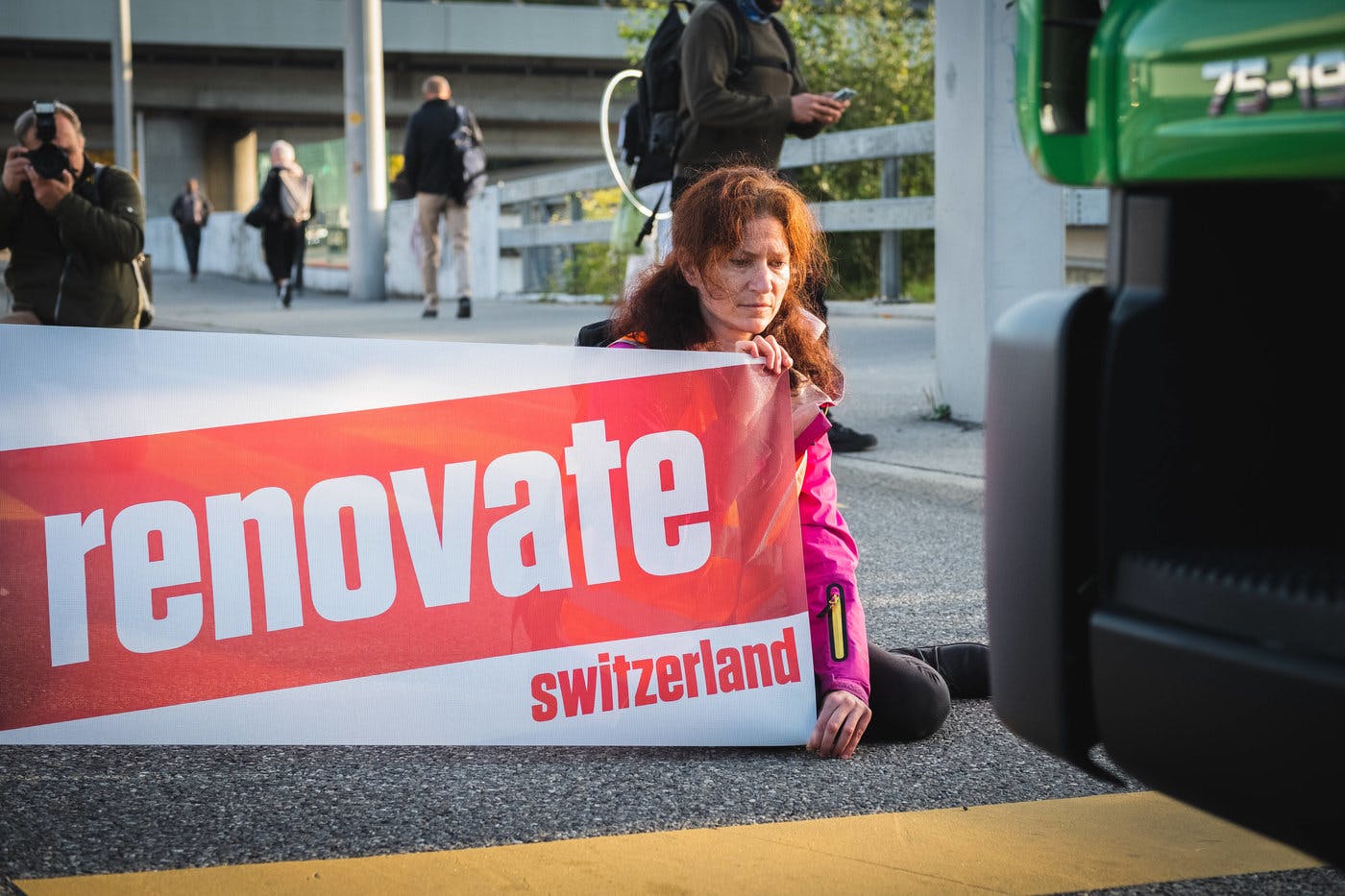 Julia Steinberger protesting on a highway in Switzerland